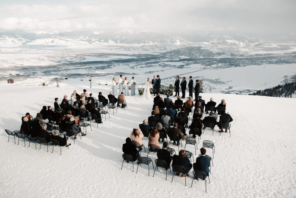 Winter wedding ceremony in mountains of the Tetons.
