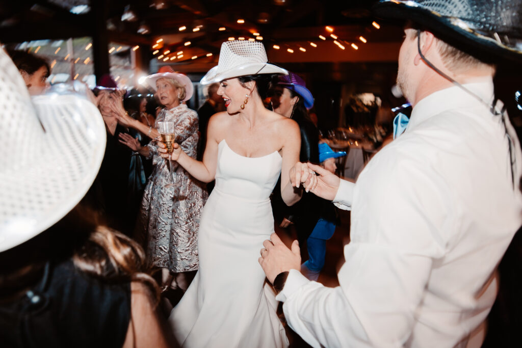 A bride and groom dance at their wedding reception at the Jackson Hole Mountain Resort wedding venue.